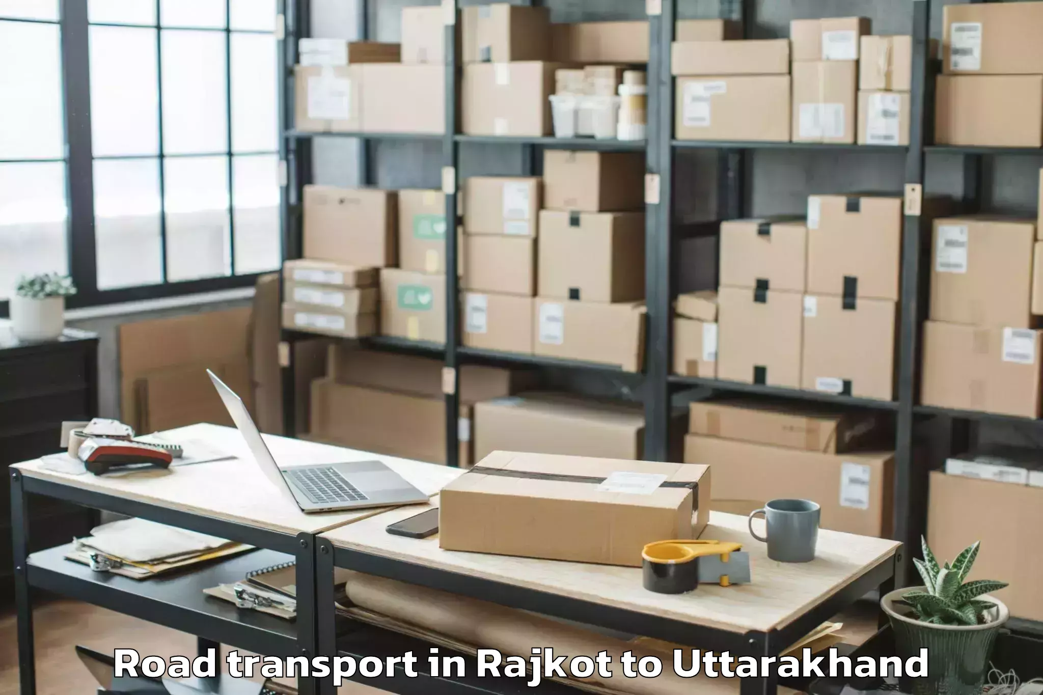 Hassle-Free Rajkot to Dhoomakot Road Transport